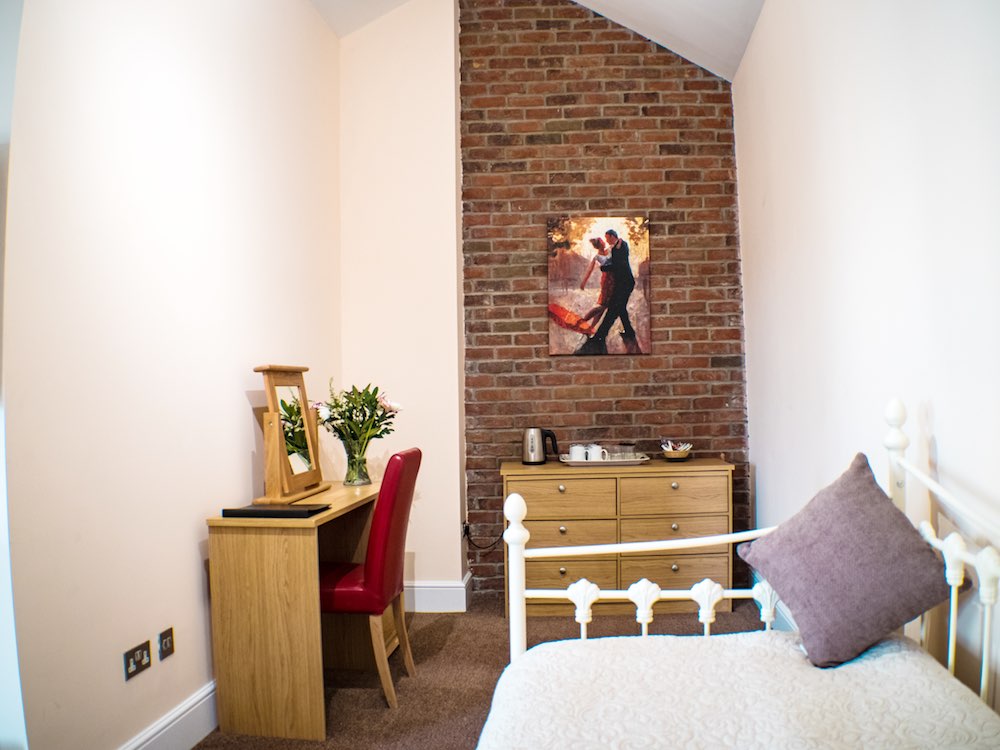 Bedroom at the HQ Bar and Restaurant